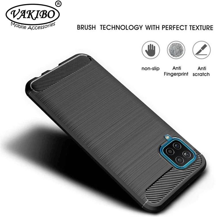 VAKIBO Carbon Fiber Brushed Black Coloured Soft TPU Back Cover Case With Camera Protection Ring Suitable for Samsung Galaxy M12